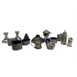 Silver circular three piece condiment set Birmingham 1923, another set, three silver mustard pots and two salts, various dates and designs, pair of dressing table candlesticks and one other
