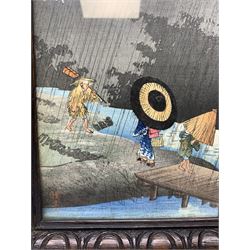 Japanese School (Meiji period): Three Figures Caught in Rain next to Temple and Figures Crossing a Bridge, pair colour woodblock prints 36cm x 16cm (2)