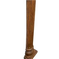 20th century turned and carved hardwood Corinthian style half round column, the acanthus leaf capital over fluted column, raised on a stepped square base, HH201cm