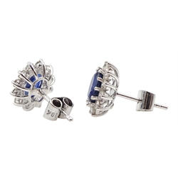 Pair of white gold sapphire and diamond cluster stud earrings, stamped 18K, total sapphire weight approx 2.00 carat, total diamond weight approx 0.75 carat