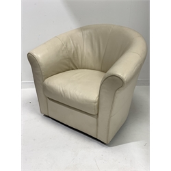 Contemporary tub shaped armchair, upholstered in cream leather, raised on swivel base 