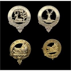 Scottish brooches: Two silver-gilt Clan Nisbet (Nisbett/Nesbit/Nesbitt), one by Wilson & Sharp, Edinburgh, 1907, D3cm and one unmarked (tested as silver), two silver for Clan Maxwell and Clan Gordon by Medlock & Craik Inverness (4)
