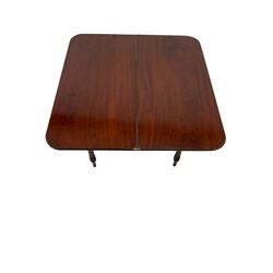 Mahogany tilt top table, the fold over top raised on turned and reeded supports 