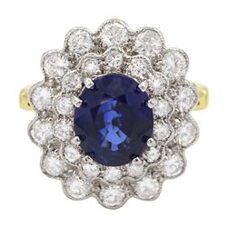 18ct gold oval cut sapphire and two row round brilliant cut diamond cluster ring, hallmarked, sapphire approx 2.55 carat