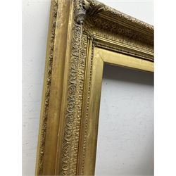 Frame - early 20th century stepped gilt frame with foliate design and scrolled fleur-de-lis corners, aperture 48.5cm x 40.1cm