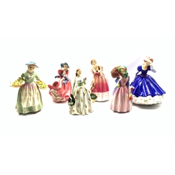 Six Royal Doulton figures comprising Carolyn, Miss Demure, Top O' the Hill, Daffy, Queen Victoria limited edition No.1394 and Mary