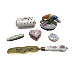 Continental gilt metal page turner with painted porcelain handle, box and cover in the form of a muff, Limoges porcelain box in the form of a Parrot H8cm, two other Limoges porcelain boxes and Samson heart shaped porcelain box (6)