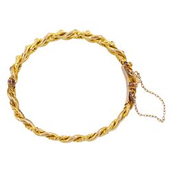 Early 20th century gold knot link and bead bangle, makers mark M & J, stamped 9ct