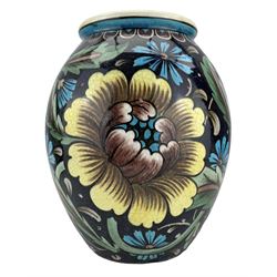 Burmantofts Faience Anglo-Persian vase, designed by Leonard King, of ovoid form, painted with stylized flowers and foliage against a blue ground, impressed factory marks, model no. 65, incised DS9-85 (677) and artists monogram LK, H24.5cm