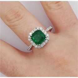 18ct white gold octagonal cut emerald and round brilliant cut diamond cluster ring, with diamond set shoulders, stamped 18K, total diamond weight approx 0.50 carat, emerald approx 1.90 carat