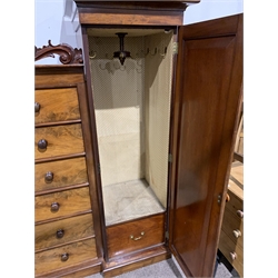 Victorian mahogany combination wardrobe, with a central bank of six drawers flanked by two full length arched panelled doors enclosing interiors fitted for hanging, raised on plinth base, W240cm, H205cm, D68cm