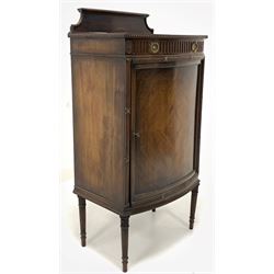 Maple & Co - Late 19th/ Early 20th century walnut bow front sheet music cabinet, raised back over cross banded and quarter sawn veneered top with moulded edge, one drawer over cupboard enclosing four sliding shelves, raised on turned fluted supports W55cm, H110cm