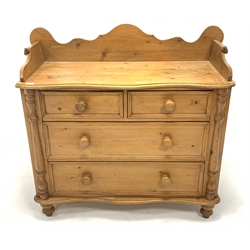 Victorian style solid pine chest, shaped raised back, fitted with two short and two long drawers enclosed by half round turned pilasters, raised on turned supports, W108cm, H100cm, D51cm