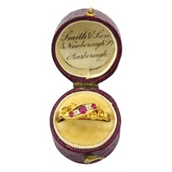 Edwardian 18ct gold five stone ruby and diamond ring, in navette and pierced scroll design setting, Birmingham 1904, in box by Smith & Son, Scarborough