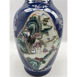 19th/ early 20th Chinese powder blue baluster form vase, the body painted with four shaped reserves in Famille Verte enamels with figures and landscapes, H44.5cm 