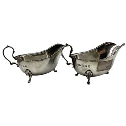 Pair of silver sauce boats with loop handles on triple shaped supports Glasgow 1913 Maker Robert Scott 6.9oz