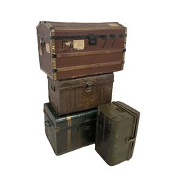 Four different trunks, including travelling trunk and three steamer trunks