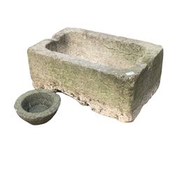 18th century limestone trough, having a sloped base and drainage hole, (W69cm) together with a small carved stone bowl planter or mortar (D26cm)
