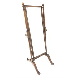 19th century mahogany cheval dressing mirror of small proportions, the swing mirror raised on ring turned supports with four splayed feet H119cm