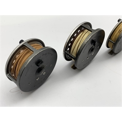Five Hardy fly fishing reels comprising 'J.L.H. Salmon No669 Made by House of Hardy England',  'Marquis #8/9 Made by Hardy Bros Ltd England' and three 'Marquis Salmon No2 Made by Hardy Bros Ltd England', with two Hardy zip cases and a small House of Hardy bag