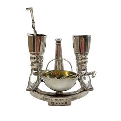 Late 19th century Elkington silver  plated horse racing cruet, the base formed as a horseshoe, jockey cap salt, riding boots for the salt and pepper etc, the handle in the form of a spur, complete with the original salt and mustard spoons, the base inscribed 'Crewe, March 9th 1896' H10cm