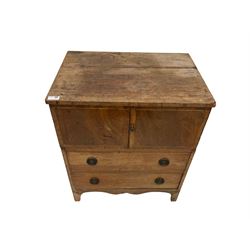 George III mahogany converted night-cabinet commode, rectangular top over two crossbanded cupboard doors and boxwood stringing, two drawers to base with ring handles and satinwood escutcheons, shaped apron