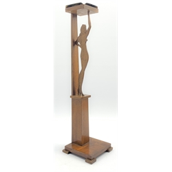  Early 20th century oak smokers stand carved as a silhouette of a lady with brass ashtray, H63cm   