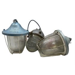 Two 20th century industrial bulkhead pendant ceiling hanging lights by Polam-Gdansk and another similar pendant light fitting (3)