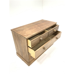 20th century pine chest fitted with two short and two long drawers, raised on plinth base, W119cm, H81cm, D56cm