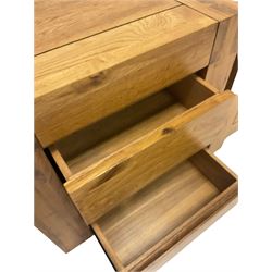 Pair of oak bedside chests, fitted with two drawers, raised on stile supports W53cm, H55cm, D40cm