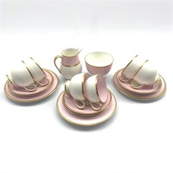 Wedgwood pink, white and gilt decorated part tea service, comprising six cups and saucers, six tea plates, sugar bowl and milk jug  