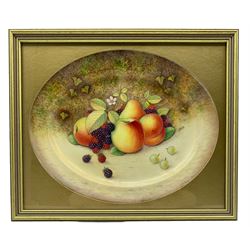 Royal Worcester framed oval dish by John Reed, hand painted with a still life of fruit upon a mossy ground, signed R. Reed, in rectangular gilt frame, 34cm x 27.5cm, excluding frame