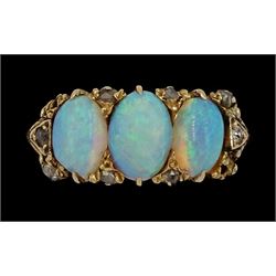 Early 20th century 15ct gold three stone opal ring, with diamond accents set between