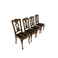 Set eight 20th century oak dining chairs, the shaped cresting rail over pierced splat, raised on cabriole supports 