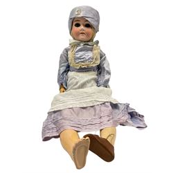 Schoenau and Hoffmeister bisque head doll with sleep eyes, open mouth, teeth, jointed composition limbs in purple dress