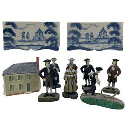 Pair of Delft style flower bricks by Williamsburg Reserve Collection, Oxford, L12.5cm, Williamsburg Royal Delft model of a house and seven figures from the Williamsburg Collection, by Lang & Wise (10) Provenance: From the Estate of the late Dowager Lady St Oswald