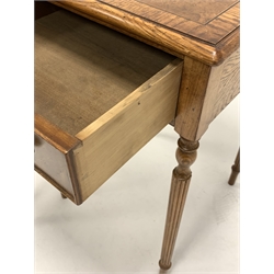  Pair of burr walnut and oak bedside tables, the cross banded top with ebonised string inlay over drawer, raised on turned and reeded supports, W51cm, H77cm, D50cm  