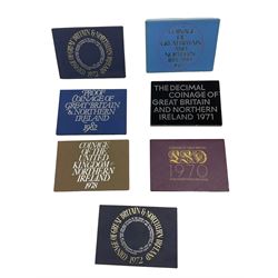 Seven Great British proof coin sets, dated 1970, 1971, two 1972, 1977, 1978 and 1982, in card folders