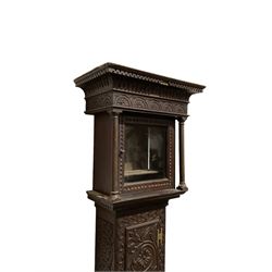 Early 18th century empty carved oak longcase - flat top with a broad cornice and key moulding, carving to the hood moulding, door and frieze, sides of the case, trunk door and front of the plinth, square hood door with free-standing pilasters and a 10-inch square dial mask.