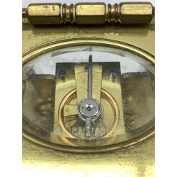 An early 20th century eight-day French Corniche cased timepiece carriage clock with a platform cylinder escapement, bevelled glass panels to case and a glass panel to the top of the case, white enamel dial with Roman numerals and minute markers, spade hands, dial inscribed 