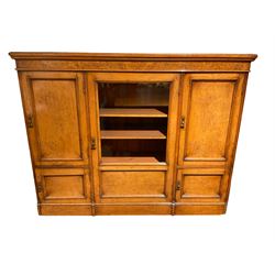 Edwardian figured oak side cabinet, fitted with five cupboards 