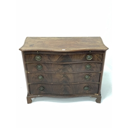Georgian well figured mahogany serpentine front chest, the moulded cross banded top over brushing slide and four long graduating drawers raised on bracket supports, with all over ebonised string inlay