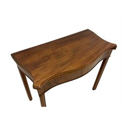 George III mahogany card table, serpentine fold-over top with extending eared corners with baize lined interior, over double gate-leg action base, raised on square moulded supports with inner chamfer
Provenance: From the Estate of the late Dowager Lady St Oswald