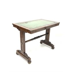 Mid 19th century rosewood library table, the top inset with tooled green leather writing surface, raised on shaped panel end supports united by turned stretcher, 91cm x 59cm, H74cm