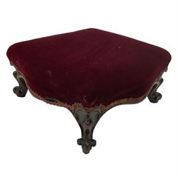 Late 19th century oak hall chair, the panel back carved with foliate lozenge (W43cm D39cm H90cm); and a Victorian footstool, seat upholstered in deep crimson velvet, raised on cabriole feet (W39cm H19cm)