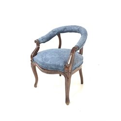 Victorian mahogany salon armchair, the sweeping back and armrests raised on moulded uprights and scrolled terminals, upholstered in blue damask fabric, raised on slender splayed and moulded supports 