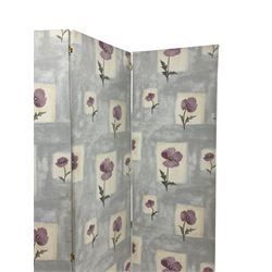 Four panel folding screen, upholstered in floral decorated fabric