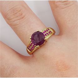 9ct gold round ruby ring, with ruby set shoulders, hallmarked