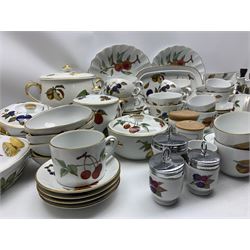 Quantity of Royal Worcester Evesham Gold and Evesham Vale tableware comprising tea cups and saucers, coffee cups and saucers, serving dishes, ramekins, vegetable dishes and covers, serving platters, soup bowls, etc. (112 pieces)