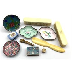 Art Deco ivorine pill box decorated with a stylized bust of a lady, Victorian brass desk seal, Cloisonne match box case, Edwardian ivory backed brushes, Continental enamelled dishes etc 